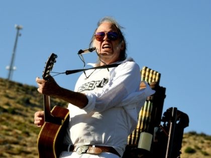 LAKE HUGHES, CALIFORNIA - SEPTEMBER 14: Neil Young performs at Harvest Moon: A Gathering to benefit The Painted Turtle and The Bridge School at Painted Turtle Camp on September 14, 2019 in Lake Hughes, California. (Photo by Kevin Winter/Getty Images)