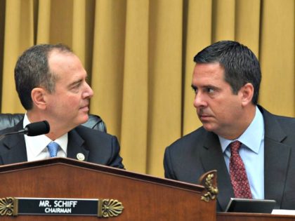 House Intelligence Committee Chairman Adam Schiff, left, speaks with ranking member Devin