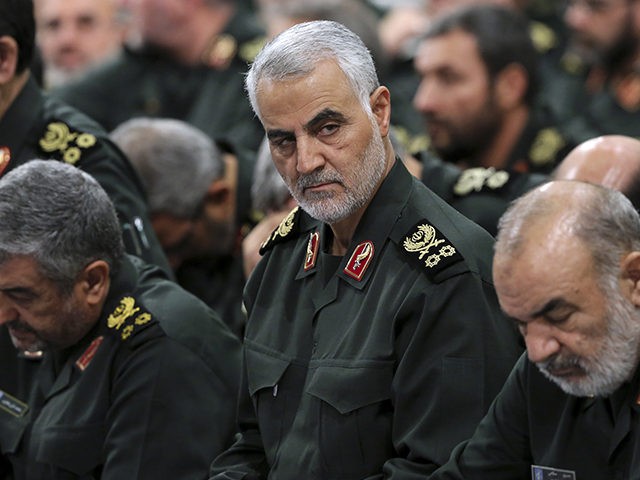 FILE- In this Sept. 18, 2016 file photo released by an official website of the office of the Iranian supreme leader, Revolutionary Guard Gen. Qassem Soleimani, center, attends a meeting in Tehran, Iran. The long shadow war between Israel and Iran has burst into the open in recent days, with …