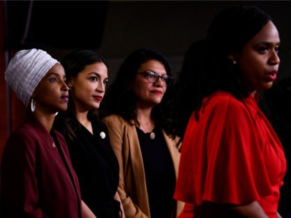 US Representatives Ayanna Pressley (D-MA) speaks as, Ilhan Abdullahi Omar (D-MN)(L), Rashida Tlaib (D-MI) (2R), and Alexandria Ocasio-Cortez (D-NY) hold a press conference, to address remarks made by US President Donald Trump earlier in the day, at the US Capitol in Washington, DC on July 15, 2019. - President Donald …