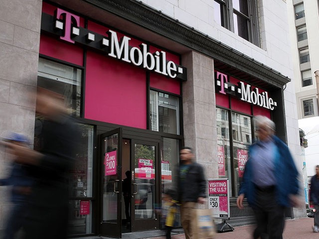 SAN FRANCISCO, CA - APRIL 24: Pedestrians walk by a T-Mobile store on April 24, 2017 in Sa