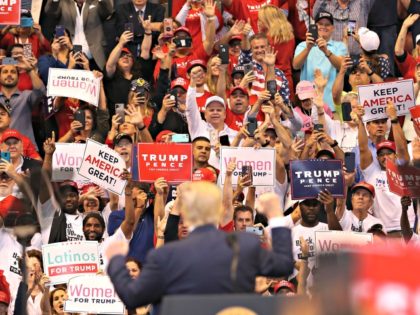 SUNRISE, FLORIDA - NOVEMBER 26: People cheer as they listen to U.S. President Donald Trump speak during a homecoming campaign rally at the BB&T Center on November 26, 2019 in Sunrise, Florida. President Trump continues to campaign for re-election in the 2020 presidential race. (Photo by Joe Raedle/Getty Images)