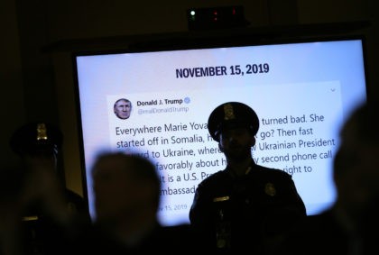 WASHINGTON, DC - NOVEMBER 15: A tweet from U.S. President Donald Trump created while former U.S. Ambassador to Ukraine Marie Yovanovitch's testifies before the House Intelligence Committee is shown in the Longworth House Office Building on Capitol Hill November 15, 2019 in Washington, DC. In the second impeachment hearing held …