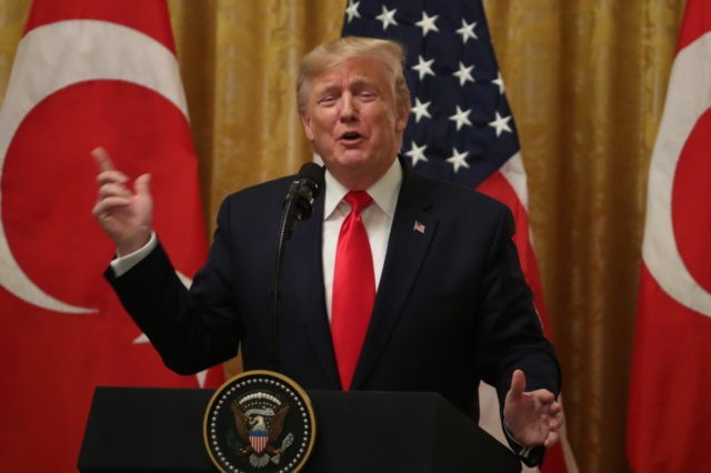 WASHINGTON, DC - NOVEMBER 13: U.S. President Donald Trump answers a media question during a press conference with Turkish President Recep Tayyip Erdogan in the East Room of the White House on November 13, 2019 in Washington, DC. During their meeting, Trump and Erdogan were scheduled to discuss Turkey's purchase …