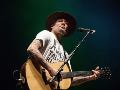 US guitar player and singer Ben Harper performs on stage during the Vieilles Charrues music festival on July 20, 2019 in Carhaix-Plouger, western France. (Photo by LOIC VENANCE / AFP) (Photo credit should read LOIC VENANCE/AFP via Getty Images)