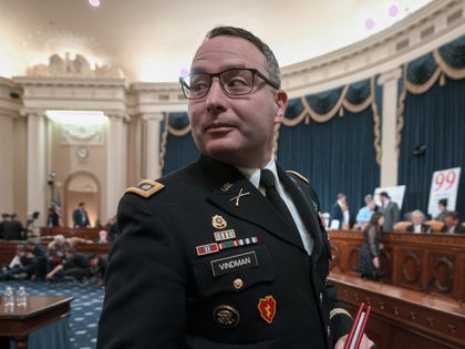 National Security Council aide Lt. Col. Alexander Vindman leaves the hearing room during a break from testifying before the House Intelligence Committee on Capitol Hill in Washington, Tuesday, Nov. 19, 2019, during a public impeachment hearing of President Donald Trump's efforts to tie U.S. aid for Ukraine to investigations of …