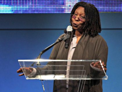Actress Whoopie Goldberg introduces Steven Spielberg before he was awarded the 2009 Liberty Medal at the Constitution Center in Philadelphia on Thursday night, Oct. 8, 2009. (AP Photo/Laurence Kesterson