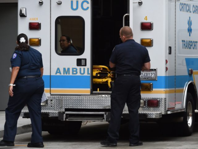 Ambulance staff at the Ronald Reagan UCLA Medical Center during their Ebola virus readiness drill to test their ability to diagnose and treat Ebola patients in Los Angeles on October 17, 2014. The United States and Canada announced stepped-up airport screening measures to look for passengers carrying Ebola, as the …