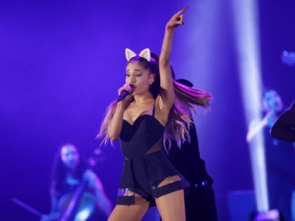 FILE - In this Aug. 26, 2015 file photo, Ariana Grande performs during the honeymoon tour concert in Jakarta, Indonesia. Grande's management team says the singer's concerts will be canceled through June 5, 2017, after a bombing following her concert in Manchester, England left 22 people dead. (AP Photo/Achmad Ibrahim, …