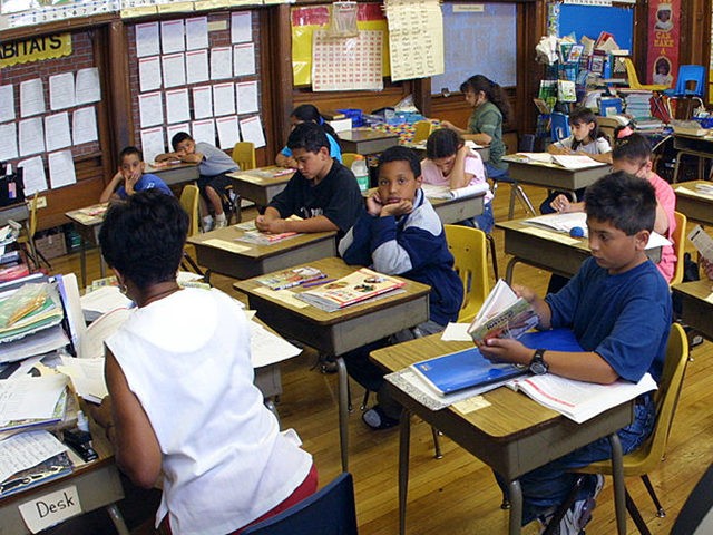 391429 02: Students in Ms. Newman''s third grade class attend summer school June 3, 2001 a