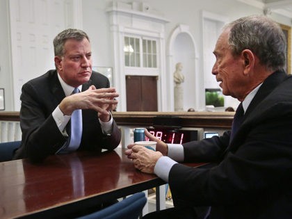 New York City Mayor-elect Bill de Blasio, left, joins Mayor Michael Bloomberg for a meeting in the "Bull Pen," the mayor's main City Hall office, on Wednesday, Nov. 6, 2013, in New York. De Blasio, who beat out Republican Joe Lhota by a large margin, follows the three-term reign of …