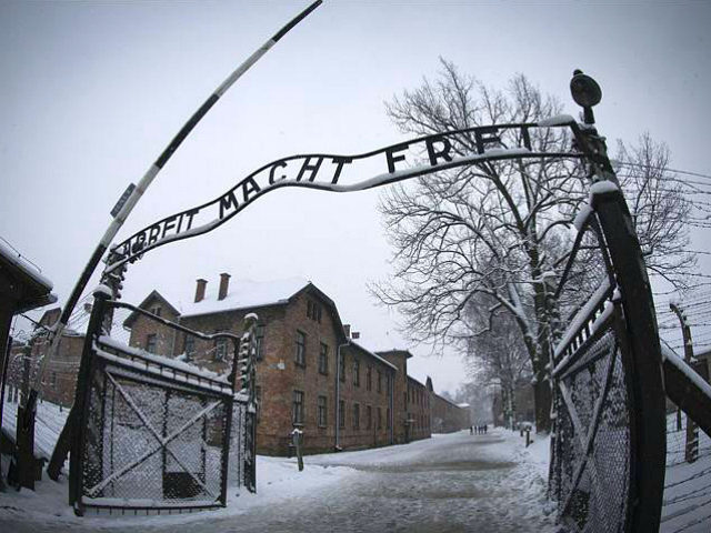 The entrance to the former Nazi concentration camp Auschwitz-Birkenau with the lettering 'Arbeit macht frei' ('Work makes you free') is pictured in Oswiecim, Poland on January 25, 2015, days before the 70th anniversary of the liberation of the camp by Russian forces. (Photo by Joël SAGET / AFP) (Photo credit …