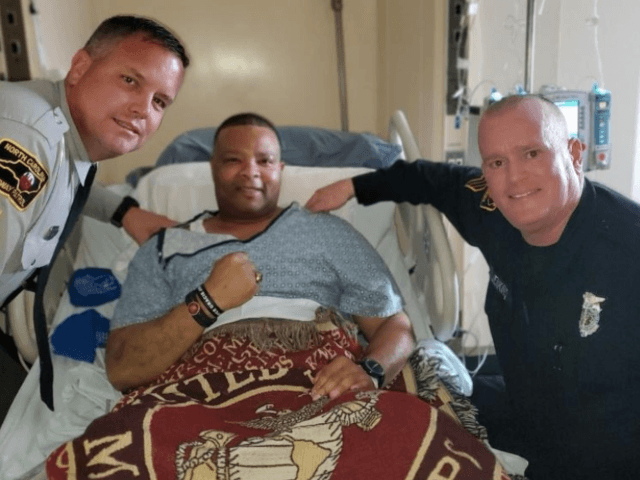 @NCSHP members visit Trooper Mike Dawkins in the hospital while he receives treatment for