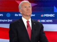 ATLANTA, GEORGIA - NOVEMBER 20: Former Vice President Joe Biden (L) listens as Sen. Bernie Sanders (I-VT) speaks during the Democratic Presidential Debate at Tyler Perry Studios November 20, 2019 in Atlanta, Georgia. Ten Democratic presidential hopefuls were chosen from the larger field of candidates to participate in the debate …