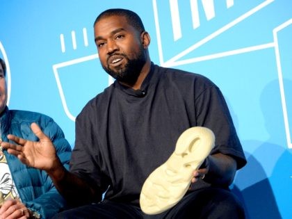 NEW YORK, NEW YORK - NOVEMBER 07: Steven Smith and Kanye West speak on stage at the "