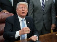 US President Donald Trump speaks to the press after signing a proclamation calling for a national day of prayer on September 3 for those affected by Hurricane Harvey in the Oval Office at the White House in Washington, DC, on September 1, 2017. / AFP PHOTO / NICHOLAS KAMM (Photo …