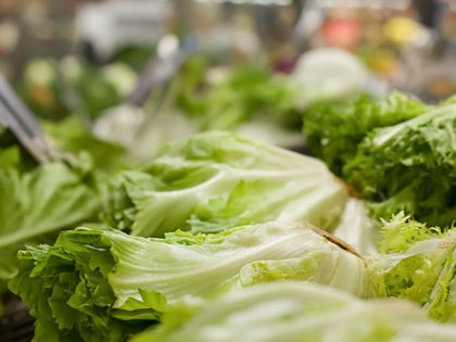 Concept of healthy and organic food. Lettuce salad at supermarket.