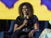 Michelle Obama and Gayle King seen at the 2019 Essence Festival at the Mercedes-Benz Superdome, Saturday, July 6, 2019, in New Orleans. (Photo by Amy Harris/Invision/AP)