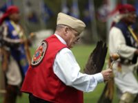 FILE - In this June 15, 2012, file photo, Jerry Best, a Vietnam War veteran of the Cheyenne tribe, dances on during a Native American blessing for veteran and active-duty servicemen in Camp Pendleton, Calif. "The Warrior Tradition," a new film set to air on most PBS stations Monday, Nov. …
