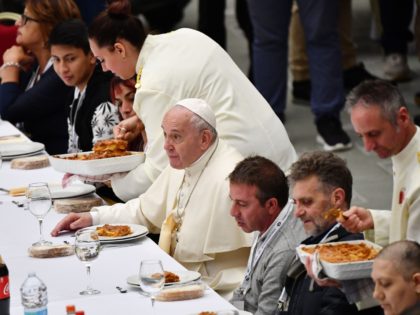 Pope Francis (C) has a lunch with people, on November 17, 2019, at the Paul VI audience hall in Vatican, to mark the World Day of the Poor. (Photo by Vincenzo PINTO / AFP) (Photo by VINCENZO PINTO/AFP via Getty Images)