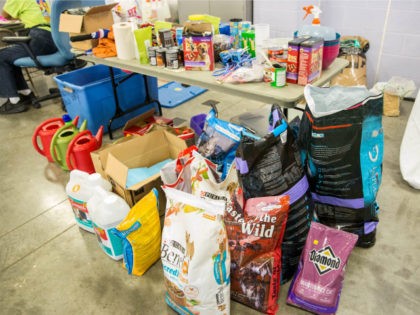 Pet food and supplies donated to the Delco Center in east Austin Thursday, August 31, 2017