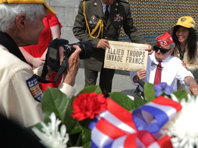 WASHINGTON, DC - JUNE 06: World War II veteran Robert Levine (2nd ) poses for a photograph