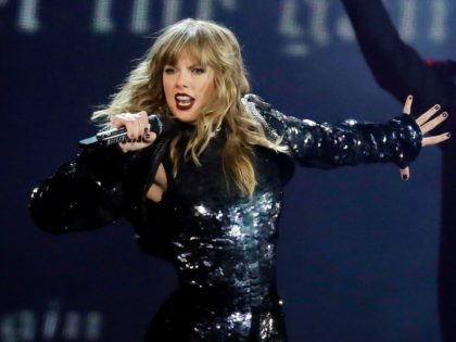 This May 8, 2018 file photo shows Taylor Swift performing during her "Reputation Stadium Tour" opener in Glendale, Ariz. A Kentucky woman recovering in the hospital from a car crash says Swift sent her flowers and a handwritten note. She doesn't know how the singer found out about her injuries, …