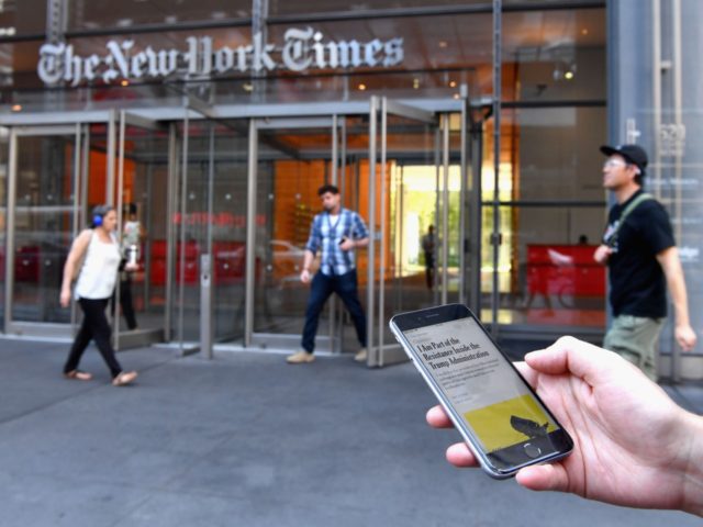 A smartphone displaying a New York Times opinion piece titled "I Am Part of the Resistance Inside the Trump Administration" is held up in this illustration in front of the New York Times building on September 6, 2018 in New York. - A furious Donald Trump called September 5, 2018 …