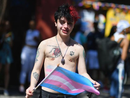 Transgender boy Damian of New York takes part in the NYC Pride March as part of World Prid