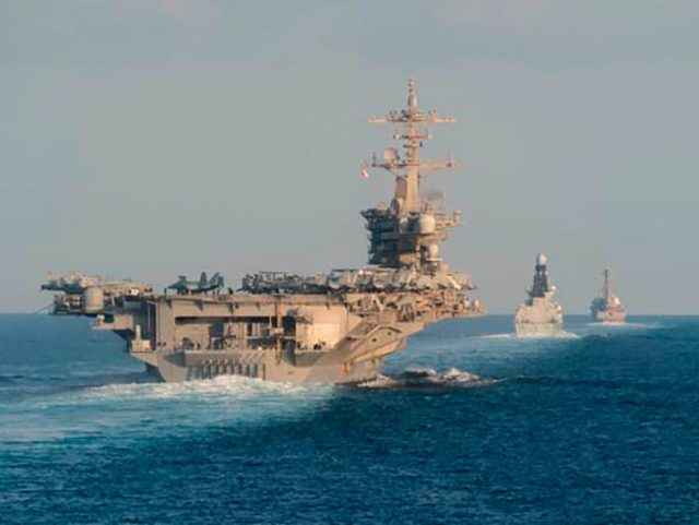 In this Tuesday, Nov. 19, 2019, photo made available by U.S. Navy, the aircraft carrier US
