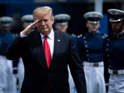 US President Donald Trump salutes as he arrives for the 2019 graduation ceremony at the United States Air Force Academy May 30, 2019, in Colorado Springs, Colorado. (Photo by Brendan Smialowski / AFP) (Photo credit should read BRENDAN SMIALOWSKI/AFP via Getty Images)