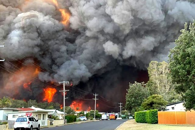 One dead, at least 100 homes lost in Australia bushfires