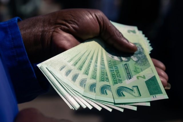 New Zimbabwe two-dollar notes have been issued to help ease a chronic cash shortage in the country Zimbabwe issues fresh banknotes to ease cash shortages