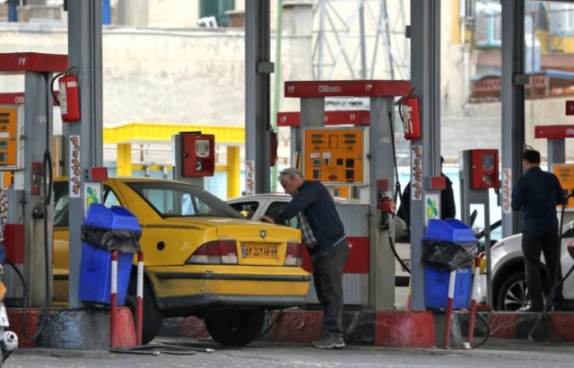 Iran moves on ultra-cheap petrol, starts rationing