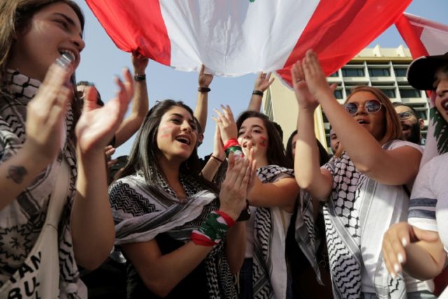 Young Lebanese protesters demand better future -- at home