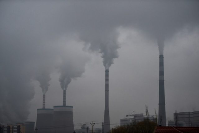 China adds coal power despite climate pledge: report