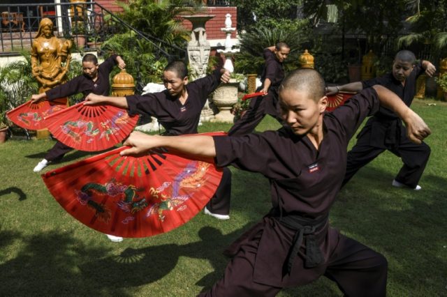 The Kung Fu Nuns group in New Delhi travel across South Asia to promote awareness about human trafficking Nun-chucks: kung fu sisters battle stereotypes