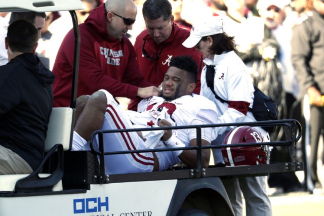 Alabama Mississippi St Football Tua Tagovailoa Alabama quarterback Tua Tagovailoa (13) is carted off the field after getting injured in the first half of an NCAA college football game against Mississippi State in Starkville, Miss., Saturday, Nov. 16, 2019. (AP Photo/Rogelio V. Solis) The Associated Press
