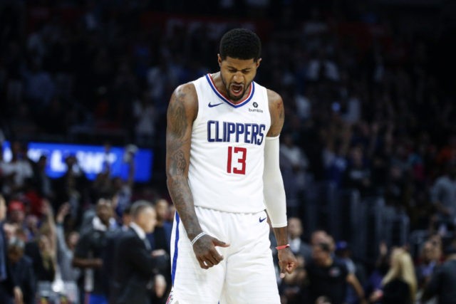 APTOPIX Thunder Clippers Basketball Los Angeles Clippers' Paul George (13) reacts after hitting a 3 point shot against the Oklahoma City Thunder during the second half of an NBA basketball game, Monday, Nov. 18, 2019, in Los Angeles. The Clippers won 90 88. (AP Photo/Ringo H.W. Chiu) The Associated Press