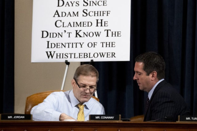 Trump Impeachment Devin Nunes, Jim Jordan Ranking member Rep. Devin Nunes of Calif., right, and Rep. Jim Jordan, R Ohio, left, huddle as U.S. Ambassador to the European Union Gordon Sondland testifies before the House Intelligence Committee on Capitol Hill in Washington, Wednesday, Nov. 20, 2019, during a public impeachment hearing of President Donald Trump's efforts to tie U.S. aid for Ukraine to investigations of his political opponents. (Anna Moneymaker/Pool Photo via AP) The Associated Press