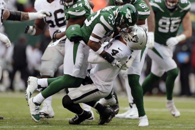 Raiders Jets Football New York Jets strong safety Jamal Adams (33) sacks Oakland Raiders quarterback Derek Carr (4) during the first half of an NFL football game Sunday, Nov. 24, 2019, in East Rutherford, N.J. (AP Photo/Adam Hunger) The Associated Press
