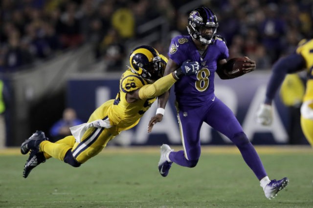 Ravens Rams Football Baltimore Ravens quarterback Lamar Jackson, right, is tackled by Los Angeles Rams defensive end Dante Fowler during the second half of an NFL football game Monday, Nov. 25, 2019, in Los Angeles. (AP Photo/Marcio Jose Sanchez) The Associated Press