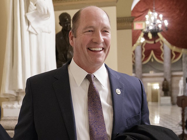 Rep. Ted Yoho, R-Fla., a member of the conservative Freedom Caucus smiles following a TV i