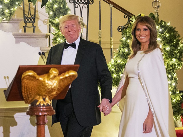 President Donald Trump with first lady Melania Trump walk from the residence to speak in t