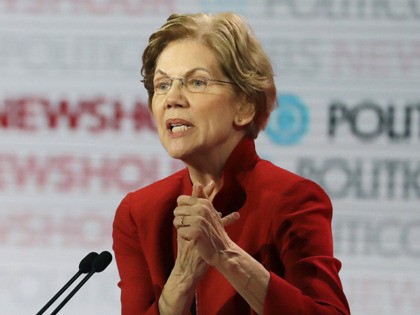 Democratic presidential candidate Sen. Elizabeth Warren, D-Mass., right, speaks beside Sou