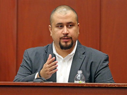 George Zimmerman looks at the jury as he testifies in a Seminole County courtroom Tuesday, Sept. 13, 2016 in Orlando, Fla. Matthew Apperson is accused of trying to kill Zimmerman by shooting into his truck during a dispute last year. (Red Huber/Orlando Sentinel via AP, Pool)