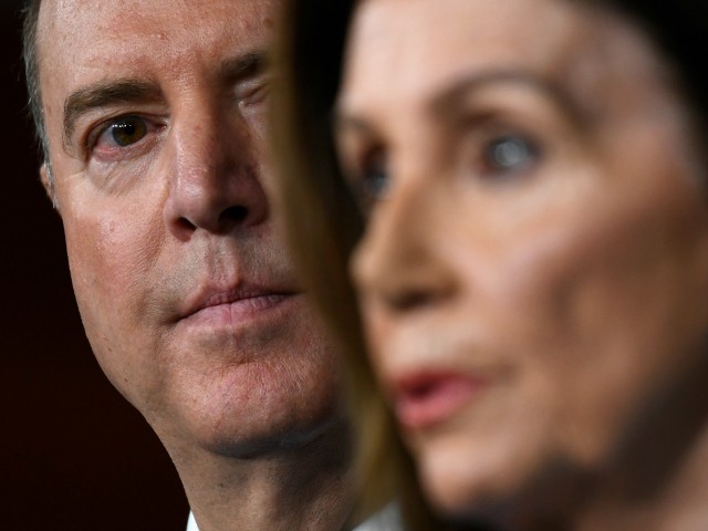 House Intelligence Committee Chairman Rep. Adam Schiff, D-Calif., left, listens as House Speaker Nancy Pelosi of Calif., right, speaks during a news conference on Capitol Hill in Washington, Wednesday, Oct. 2, 2019 (AP Photo/Susan Walsh)