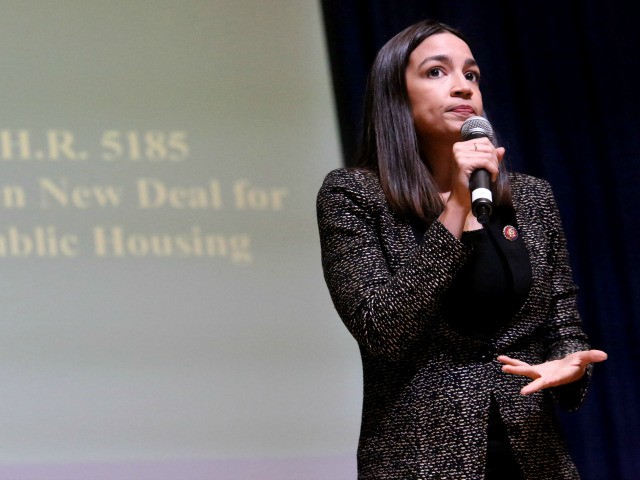 Rep. Alexandria Ocasio-Cortez (D-NY) speaks during a Green New Deal For Public Housing Town Hall on December 14, 2019 in the Queens borough of New York City. (Photo by Yana Paskova/Getty Images)