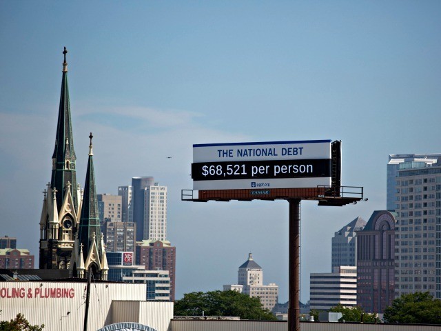 MILWAUKEE, WISCONSIN - SEPTEMBER 18: Billboard showing the national debt and each Americans share is displayed on September 18, 2019 in downtown Milwaukee, Wisconsin. (Photo by Darren Hauck/Getty Images for PGPF)