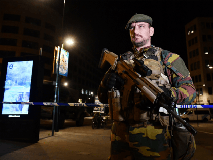 BRUSSELS, BELGIUM - JUNE 20: Armed police stand guard outside Brussels Central train stati